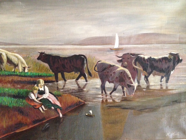 Vacas en la orilla y aguas del Lago